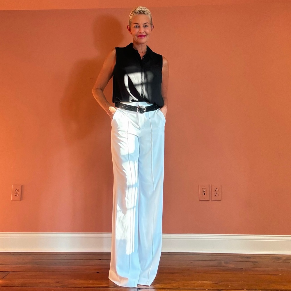 Alice + Olivia white wide legged pants.